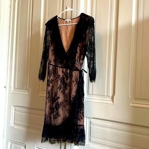 Black lace overlay on nude lining. Francesca’s, size L